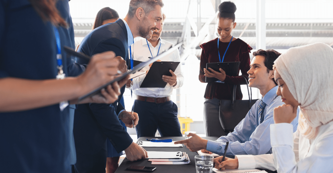 Attendees check in to conference